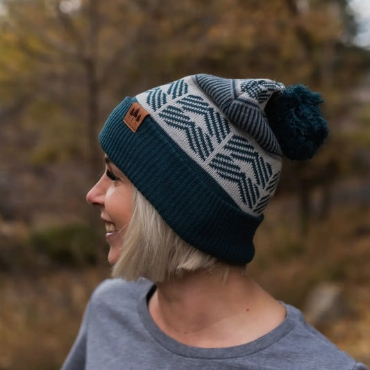 The Montana Scene Geometric Pom Beanie - Dark
Teal